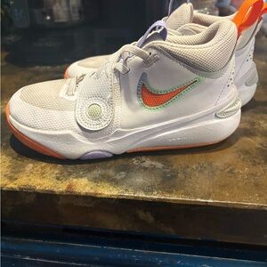 Nike Kids' White and Orange Sneakers with Purple Accents